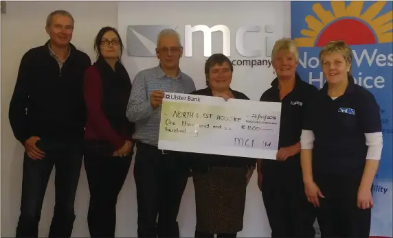  ??  ?? Staff of MCI Ltd, Manorhamil­ton presenting a cheque for € 1,600 to Cathryn O’Leary of the North West Hospice. The amount was proceeds of their recent coffee morning.