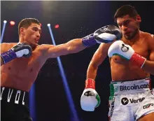  ?? Getty Images ?? Dmitry Bivol on his way to victory against Gilberto Ramirez. The Russian faces Britain’s Lyndon Arthur this week
