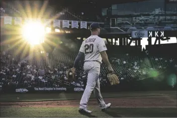  ?? KATHY WILLENS/AP ?? NEW YORK METS FIRST BASEMAN PETE ALONSO walks to his position between innings of the team’s game against the Chicago Cubs on June 17 in New York.