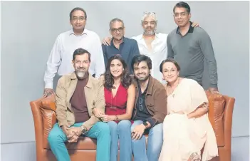  ?? — AFP file photo ?? This handout photograph shows Bollywood actors and cast members (bottom from left) Rajat Kapoor, Kumra, Ayush Mehra and Soni Razdan and (top from left) series producers Sameer Nair, Deepak Segal, Deepak Dhar along with director Ali (top second right) posing for a picture during the promotion of the Indian drama web series ‘Call My Agent: Bollywood’ which is based on the French TV series ‘Dix Pour Cent’, in Mumbai.