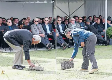  ?? Photo: PETER DRURY/FAIRFAX NZ ?? Past behind them: Tu Waaka (Tuhoe) places a peace offering which is accepted by Wayne Ngata (Te Aitanga a Hauiti/Ngati Porou) at Hauiti Marae, Tolaga Bay. The tribes’ dispute had its origins in events around the capture of Te Kooti in the 1860s.