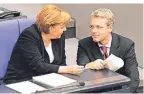  ?? FOTO: IMAGO IMAGES ?? Angela Merkel und Norbert Röttgen 2007 im Bundestag.