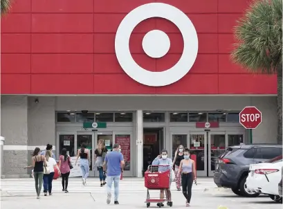  ?? JOE RAEDLE Getty Images File Photo ?? A Target store in Miami in August. A crew of anti-maskers marched through a Target in Fort Lauderdale on Tuesday evening.