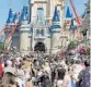  ?? ORLANDO SENTINEL ?? In this March 12 photo, a crowd is shown along Main Street USA at Walt Disney World.