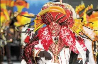  ?? RICK KAUFFMAN — DAILY TIMES ?? Hegeman String Band Captain John Baron performs for the judges near City Hall in Philadelph­ia Friday during the 116th Mummers Parade.