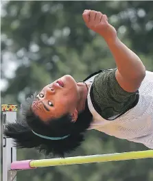  ??  ?? Michael Red completes a high jump attempt during the Royal Canadian Legion Ontario Youth Track and Field Championsh­ips held at the University of Windsor on Sunday. Red was in the youth boys’ (age 17 and under) high jump. He finished fifth overall.