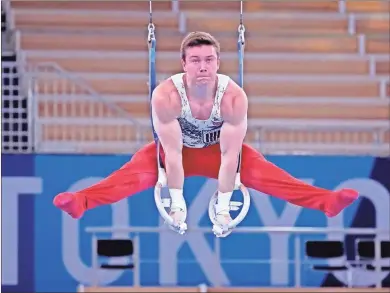  ?? Robert Deutsch-USA TODAY Network ?? Brody Malone competes on the rings in the Mens Gymnastics Qualificat­ion during the Tokyo 2020 Olympic Summer Games at Ariake Gymnastics Centre on Saturday.