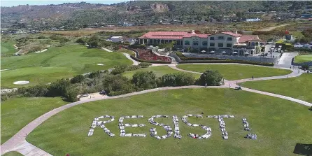  ?? AFP-Yonhap ?? This Saturday photo released by an organizati­on known as Indivisibl­e San Pedro shows protesters spelling out the word “RESIST!” at a public park nestled within Trump National Golf Course in Rancho Palos Verdes, Calif. The flash mob-style protest called...