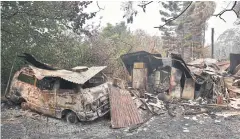  ?? AFP ?? A destroyed house and van are seen after bushfires ravaged the town of Bilpin, Australia on Sunday.