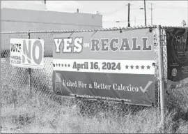  ?? ?? MARITZA HURTADO, 58, top, a former mayor of Calexico, became the new public face of the recall campaign against Ureña and another young City Council member, Gilberto Manzanarez. Above, signs for and against the recall.