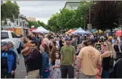  ?? ?? Downtown of Chico is seen occupied Thursday for the first Thursday Night Market of the year in Chico.