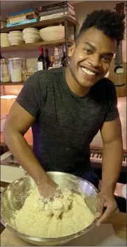  ?? MICHAEL LOWNEY — HUMPDAY DOUGH VIA THE ASSOCIATED PRESS ?? Broadway performer Max Kumangai makes sourdough bread from his apartment in New York.