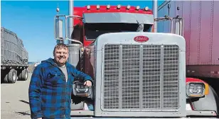  ?? GORD HOWARD TORSTAR ?? Tom Gee, who takes his truck into the U.S. three times a week, says his wife is worried he might bring COVID-19 home with him. Just in case, she stopped working so it won’t spread to her office.