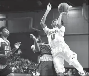  ?? The Sentinel-Record/Grace Brown ?? HOG TIED: Arkansas Razorback signee Isaiah Joe (10) puts up a shot attempt Thursday against North Little Rock’s Jeremiah Watson in the Class 7A state championsh­ip game at Bank of the Ozarks Arena. Joe led Northside with 15 points, but was held to...