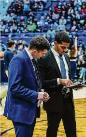  ?? UConn athletics Contribute­d photo ?? J.R. Lynch spent the 2022-23 season as a graduate assistant on Dan Hurley’s UConn men’s basketball staff. Lynch has been hired as an assistant coach by coach John Gallagher at Manhattan.