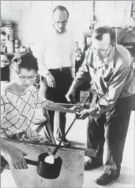  ??  ?? Rosemary Gulassa, Harvey Littleton, center, and Harvey Leafgreen during the 1962 workshop at the Toledo Museum of Art. Some of the objects they created in 1962 will be on display next week.