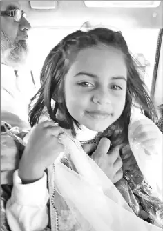  ??  ?? File photo of Zainab Fatima Ameen, six, in a vehicle with her father in Kasur.