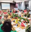  ?? Contribute­d photo ?? The operations center at NORAD is usually brimming with volunteers on Dec. 24 to answer questions about Santa and his delivery journey. This year there will be fewer volunteers because of the pandemic, but more than last year.