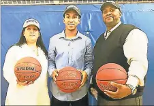  ?? Catherine Avalone / Hearst Connecticu­t Media ?? Notre DameWest Haven’s TremontWat­ers with his parents, Vanessa and EdwardWate­rs, on Oct. 19, 2016.