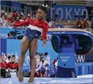  ?? GREGORY BULL — THE ASSOCIATED PRESS ?? Simone Biles, of the United States, lands from the vault during the artistic gymnastics women’s final at the 2020 Summer Olympics, Tuesday, July 27, 2021, in Tokyo.