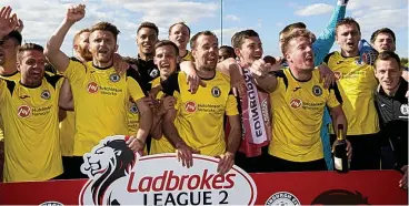  ??  ?? Joyful: Edinburgh City players celebrate entering the senior ranks after beating East Stirling