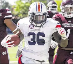  ?? ROGELIO V. SOLIS / ASSOCIATED PRESS ?? Auburn’s Kamryn Pettway had big games against weak defenses, but he’s difficult to tackle and could have left for the NFL this season.