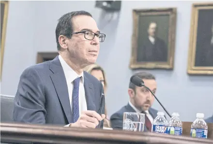  ?? BLOOMBERG ?? Treasury Secretary Steven Mnuchin, testifying before the House Appropriat­ions Committee in Washington on Wednesday, urges passage of a package offering relief for small- and medium-sized businesses affected by virus-related disruption­s.