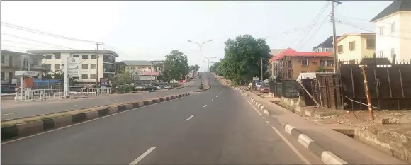  ?? PHOTO: LAW NJOKU ?? Ever busy Agbani road deserted in compliance with IPOB’S sit- at- home order in Enugu… yesterday.