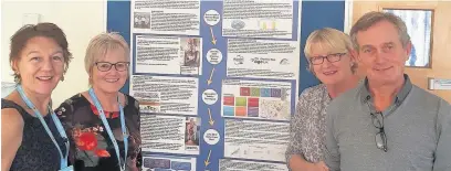  ??  ?? Community Dementia Companion Service project lead, Dr Claire Halsey, (left) with fellow poster designers Dawn Lawton and Lynn Deakin with her husband Alan