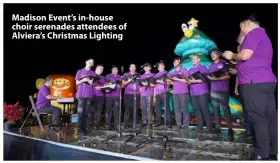  ?? ?? Madison Event’s in-house choir serenades attendees of Alviera’s Christmas Lighting