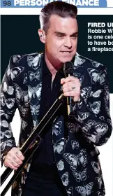  ??  ?? FIRED UP: Robbie Williams is one celebrity to have bought a fireplace AS the cold nights draw in there is nothing more comforting than a traditiona­l home fire. Here, The Mail on Sunday explores some red-hot options that will keep you warm this winter...