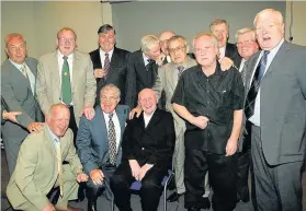  ??  ?? REUNITED Tommy, second left back row, with Lions in 2004. Picture: Garry F McHarg