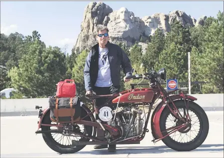  ?? Contribute­d photos ?? Above, Ridgefield­er Jeff McAllister with his 1927 Indian Big Chief at Mount Rushmore. He recently completed a3,750-mile journey on the bike as part of the Motorcycle Cannonball. At left, McAllister’s Indian motorcyle and friend Denis Sharon’s,1916 Harley Davidson, foreground, on the road.