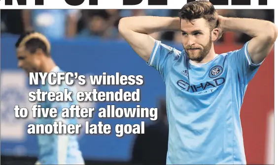  ??  ?? YELLING TIMBER: NYCFC forward Patrick Mullins reacts after Portland’s goal. Earlier, Tony Taylor ( below) was taken off the Yankee Stadium field on a stretcher during Sunday night’s 1- 0 loss to the Timbers.
Andrew Theodoraki­s
