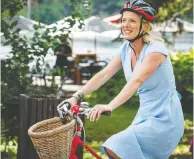  ?? ERROL MCGIHON / POSTMEDIA NEWS FILES ?? Catherine McKenna arrives on her bicycle at a press conference to announce she will not run in the next election.