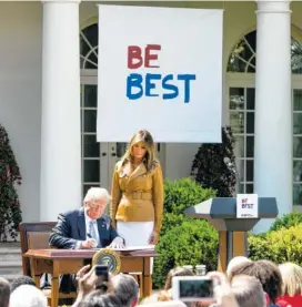  ?? PHOTO BY DOUG MILLS/THE NEW YORK TIMES ?? First lady Melania Trump watches as President Donald Trump signs a proclamati­on stating Monday as “Be Best” day, named for the first lady’s initiative, at the White House.