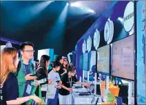  ?? PROVIDED TO CHINA DAILY ?? Attendees learn about Baidu’s products at the Create 2024 Baidu AI Developer Conference held on Tuesday in Shenzhen, Guangdong province.