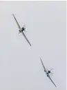  ??  ?? A Battle of Britain Memorial Flight flypast of a Spitfire and a Hurricane was organised by the RAF for Captain Tom’s birthday.