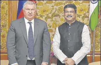  ?? PTI ?? Rosneft chairman Igor Sechin with oil minister Dharmendra Pradhan in New Delhi on Tuesday.