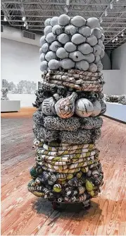  ??  ?? The pieces in “Fired, Broken, Gathered, Heaped” include stacked totemlike sculptures that capture Rosen’s duality, at once theatrical and calmly ordered.