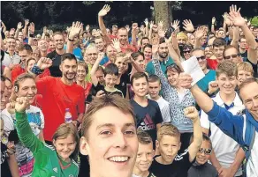  ??  ?? Stephen Milne at a previous Perth Park Run with some of the runners.