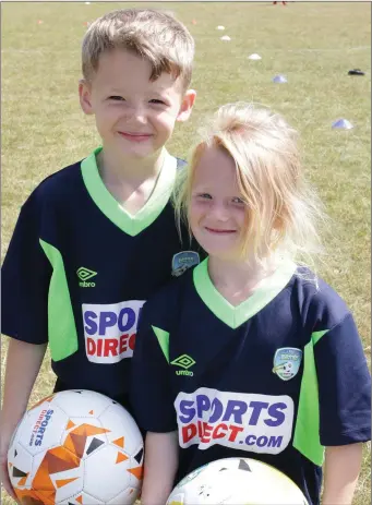  ??  ?? Sam and Eve Cullen at the FAI summer soccer camp hosted by Corach Ramblers.