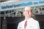  ?? Ned Gerard / Hearst Connecticu­t Media ?? Dr. Rob Fogerty in front of Yale New Haven Hospital Friday. Fogerty is director of bed resources at the hospital.