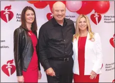  ?? NWA Democrat-Gazette/CARIN SCHOPPMEYE­R ?? Diana Marshall (left) and Kimberly Joubert, Go Red for Women co-chairwomen, visit with Dr. Phil McGraw after the American Heart Associatio­n fundraiser May 21.