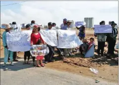  ?? TOUCH SOKHA ?? Residents of Chroy Changvar district protest in Phnom Penh yesterday morning at the site of an OCIC developmen­t project.