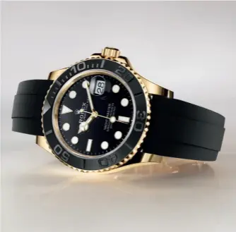  ?? ?? Rolex Oyster Perpetual Yacht-Master 42 in 18 ct yellow gold, 42 mm case, black dial, and an Oysterflex bracelet