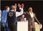  ?? Michael Woods / Arkansas Democrat-Gazette | Associated Press ?? Comedian Steve Harvey, right, has brought a new energy to the “Family Feud” franchise.