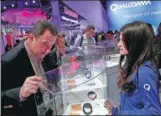  ?? PROVIDED TO CHINA DAILY ?? Attendees visit the Qualcomm booth during CES 2017 at the Las Vegas Convention Center in Las Vegas, Nevada.