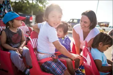  ?? Herald photo by Tijana Martin ?? Children’s Services Minister Danielle Larivee greets children during a community breakfast at Piikani First Nation after receiving a traditiona­l Blackfoot name on Thursday. @Tijana_Martin