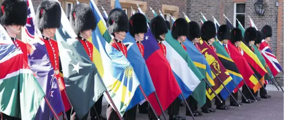  ?? Photo: DEPTFO News ?? Guards holding the flags of Commonweal­th countries during the opening of the Commonweal­th Heads of Government meeting in London.